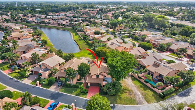 drone / aerial view with a water view