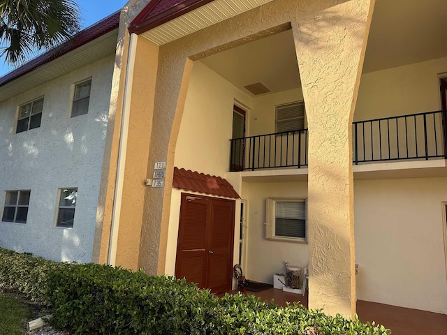 exterior space with a balcony