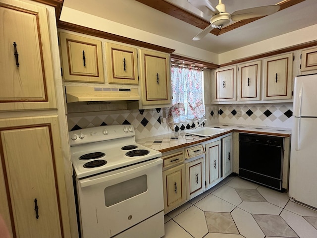 kitchen with tasteful backsplash, sink, light tile patterned floors, and white appliances