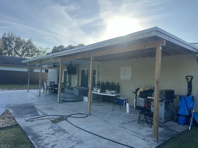 view of patio / terrace featuring ceiling fan