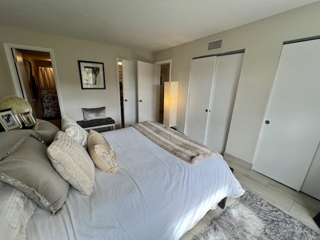 bedroom featuring a textured ceiling