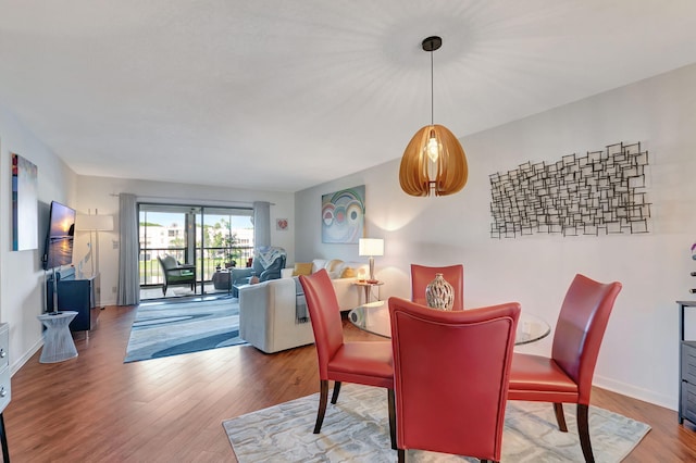 dining area featuring hardwood / wood-style floors