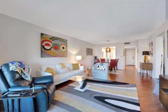 living room with hardwood / wood-style flooring