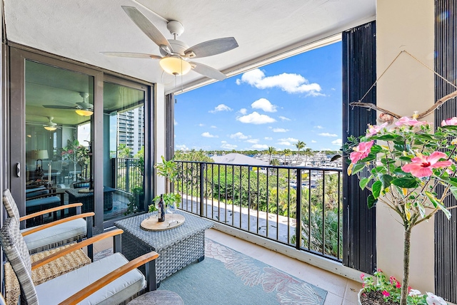 balcony featuring ceiling fan