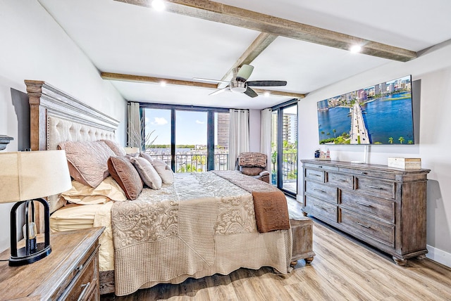 bedroom with access to outside, multiple windows, ceiling fan, and light hardwood / wood-style floors