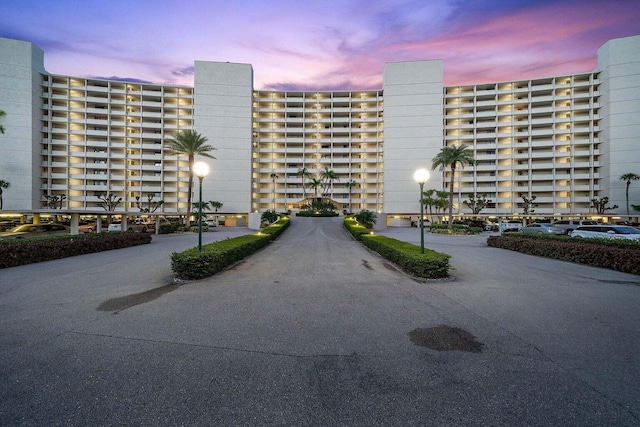 view of outdoor building at dusk