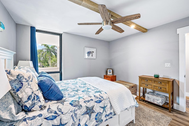 bedroom with light wood-type flooring and ceiling fan