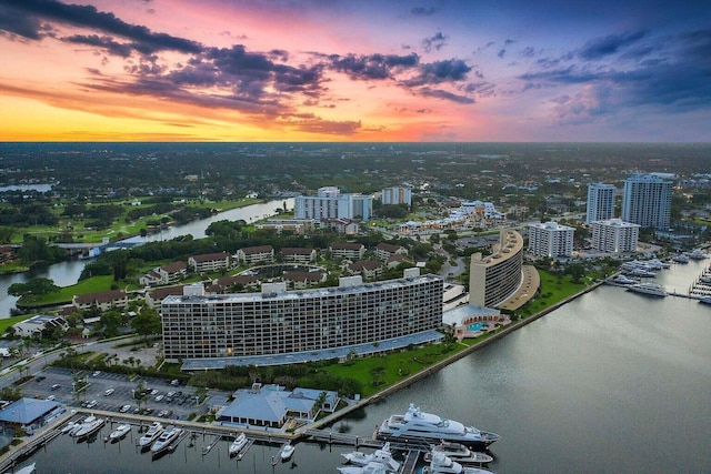 aerial view at dusk with a water view