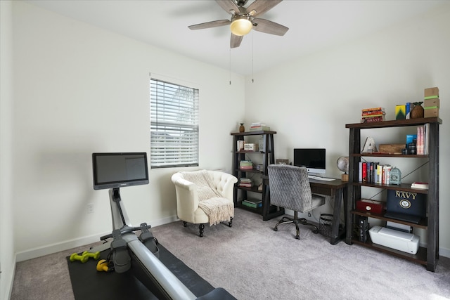 office space featuring ceiling fan and light colored carpet