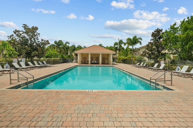 view of pool featuring a patio area