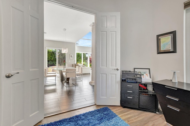 office space with light wood-type flooring