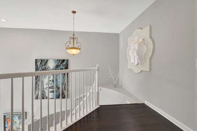 stairs with hardwood / wood-style flooring