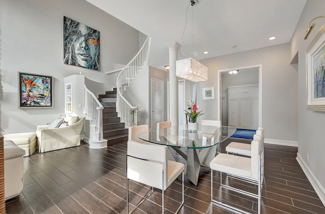 dining area featuring a chandelier and dark hardwood / wood-style floors