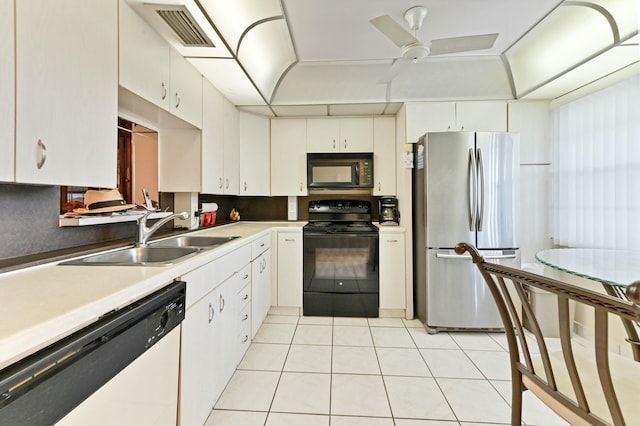 kitchen featuring black appliances, ceiling fan, white cabinets, and sink