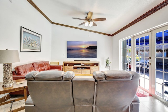 living room featuring french doors, vaulted ceiling, ceiling fan, and ornamental molding