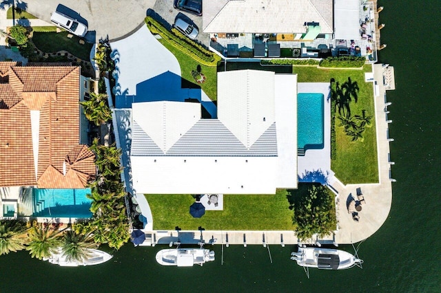 birds eye view of property featuring a water view