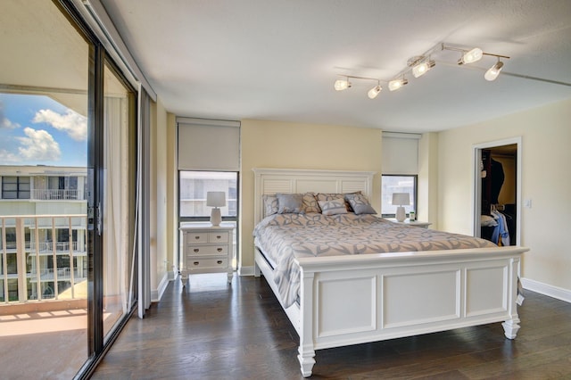 bedroom featuring dark hardwood / wood-style floors