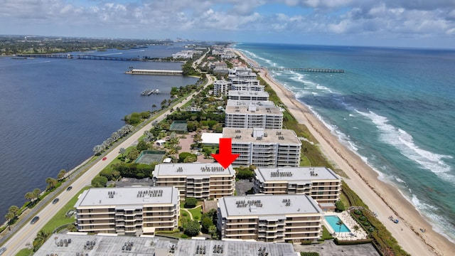 aerial view featuring a beach view and a water view