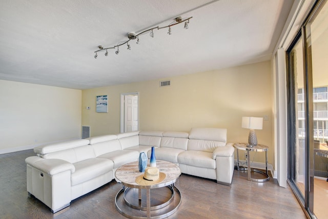 living room with dark wood-type flooring