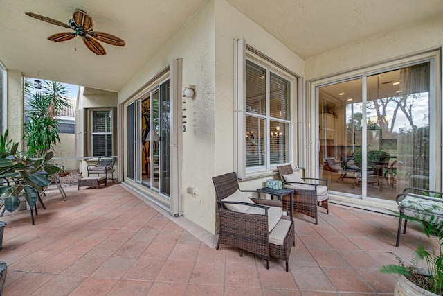 view of patio with ceiling fan