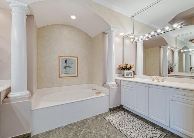 bathroom with a tub, vanity, ornamental molding, and tile patterned flooring