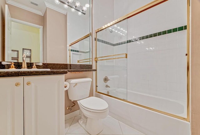 full bathroom featuring toilet, combined bath / shower with glass door, tile patterned floors, ornamental molding, and vanity