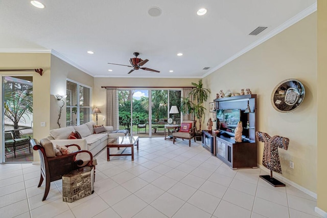 living room with ceiling fan, light tile patterned floors, and ornamental molding