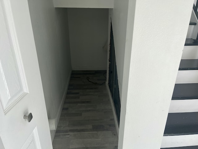 staircase featuring hardwood / wood-style floors