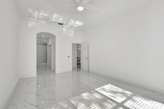 unfurnished room featuring ceiling fan