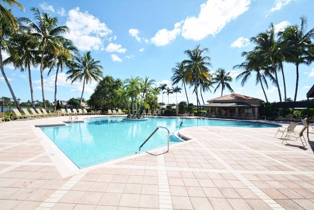 view of swimming pool featuring a patio area