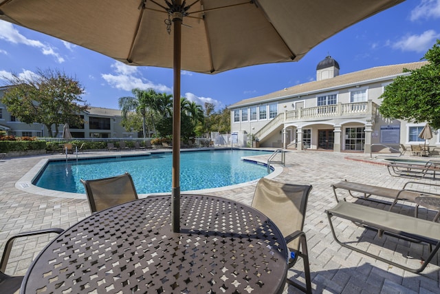 view of pool with a patio area