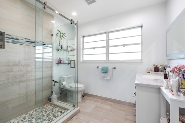 full bath featuring toilet, a stall shower, visible vents, and vanity