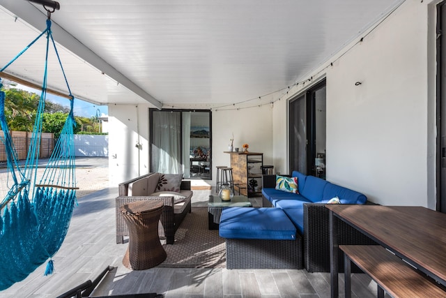 view of patio / terrace with outdoor lounge area and fence