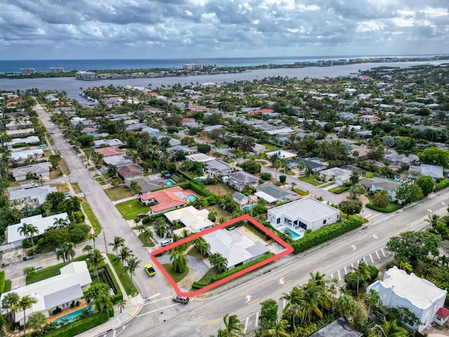 aerial view with a water view and a residential view