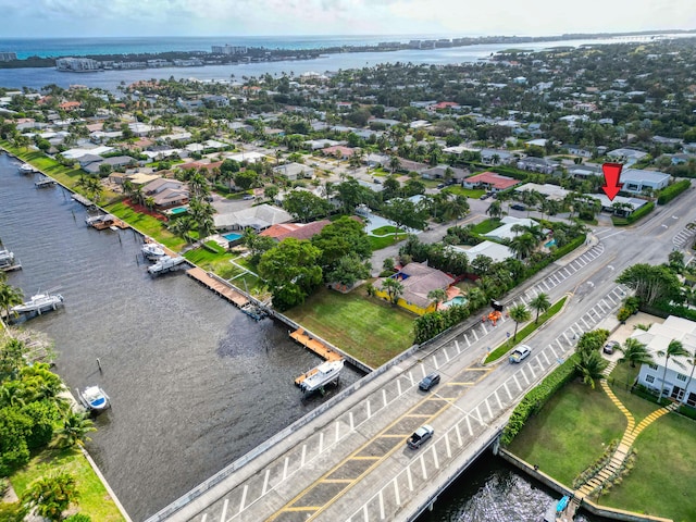 aerial view with a water view and a residential view