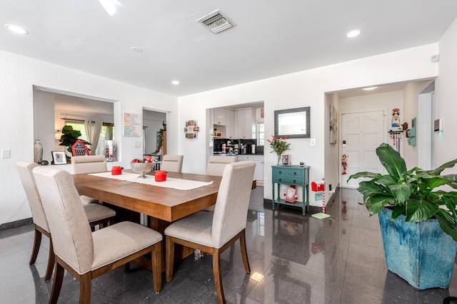 dining space with plenty of natural light, visible vents, and recessed lighting