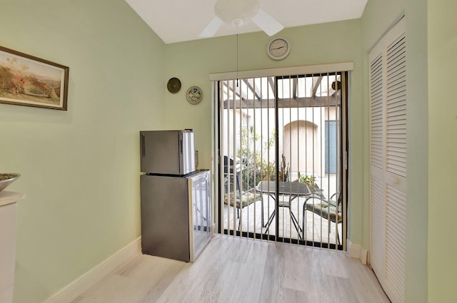 entryway with light hardwood / wood-style flooring and ceiling fan