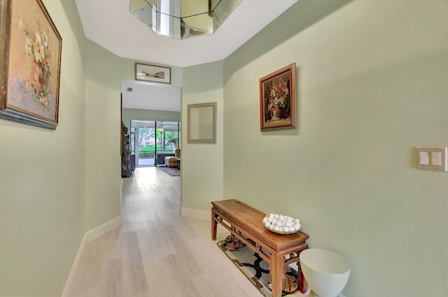 hallway featuring light hardwood / wood-style floors