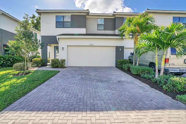 view of front of property featuring a garage