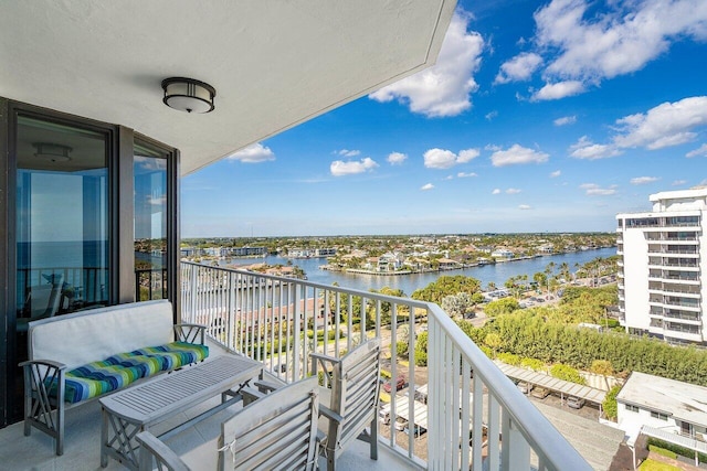 balcony featuring a water view