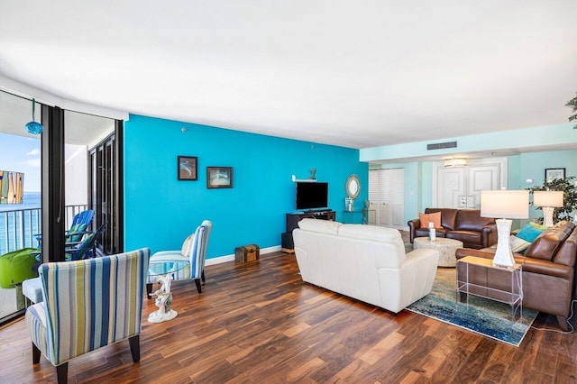 living room with dark wood-type flooring