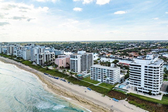 bird's eye view with a beach view and a water view