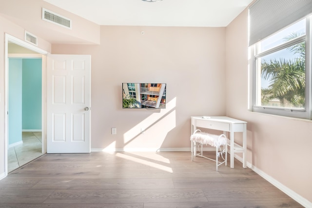 interior space with hardwood / wood-style flooring