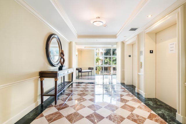 hallway with crown molding, elevator, and a tray ceiling