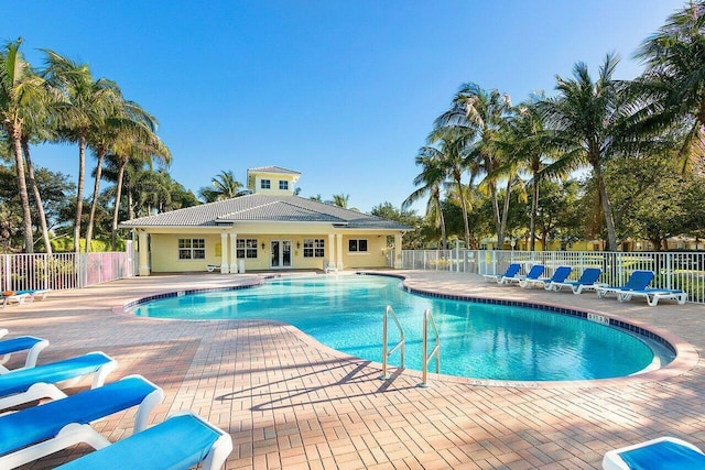 view of swimming pool with a patio area