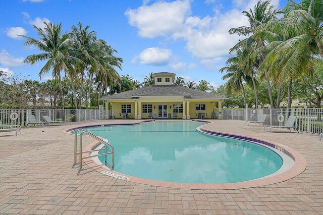 view of swimming pool featuring a patio