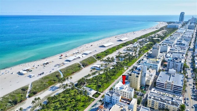 drone / aerial view with a view of the beach and a water view