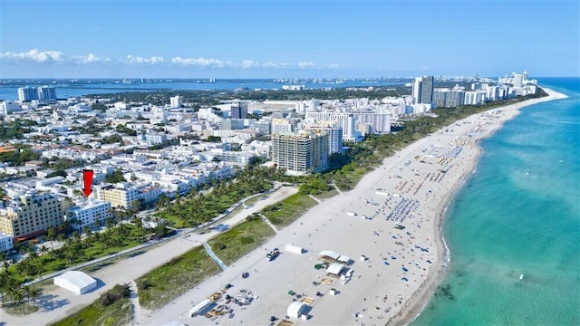 aerial view featuring a beach view and a water view