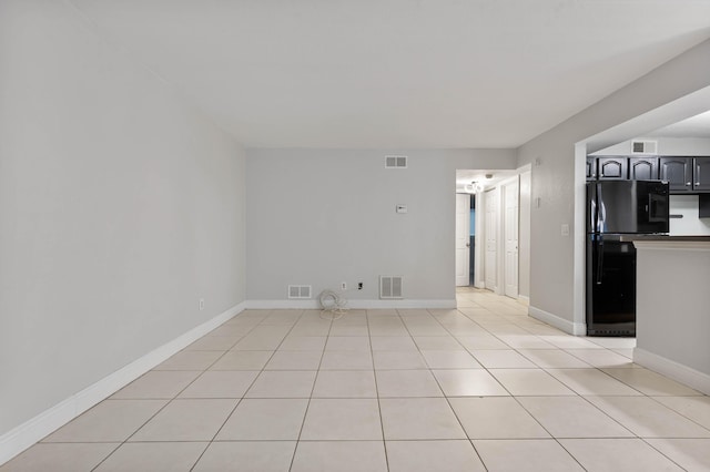 view of tiled spare room