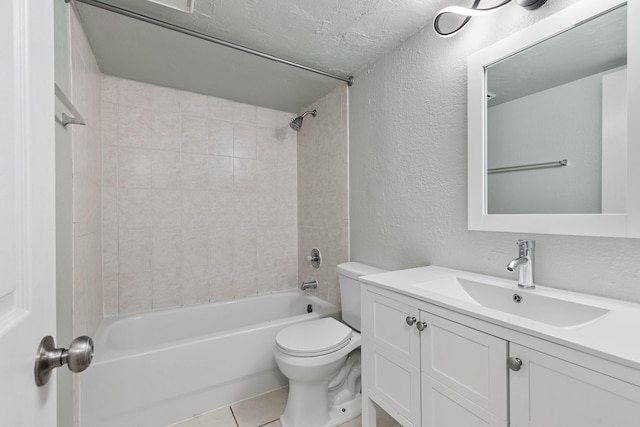 full bathroom with toilet, a textured ceiling, vanity, tiled shower / bath combo, and tile patterned flooring